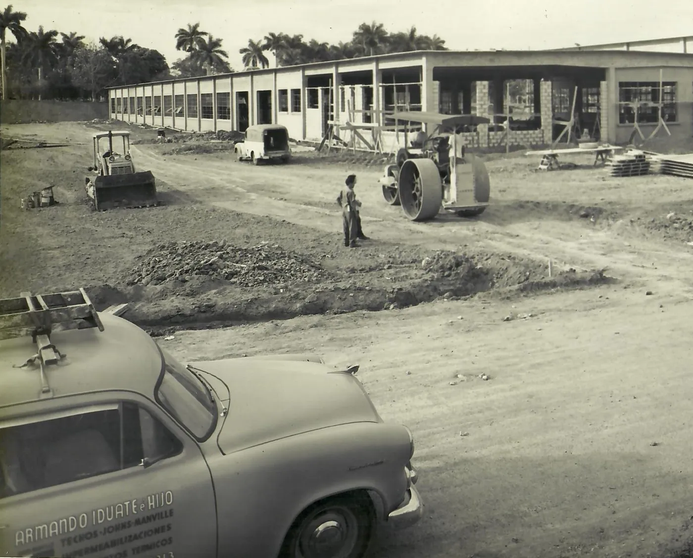 Armando Iduate e Hijo work truck at a construction site in Cuba, 1950s